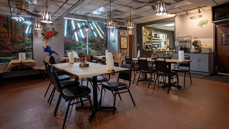 Dining room with multiple set tables