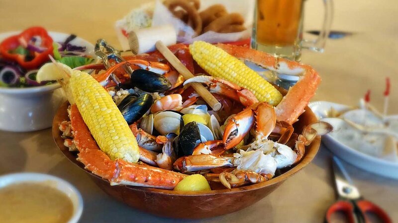 Mussels, clams. crabs pieces in a bowl