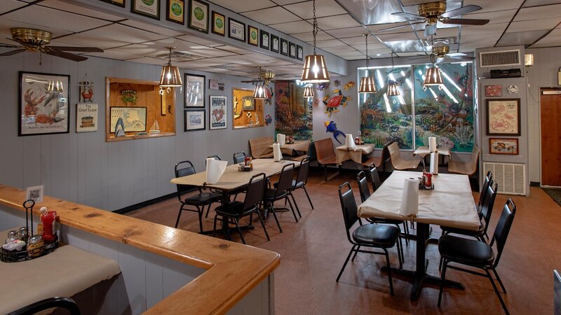 View of dining room with set tables